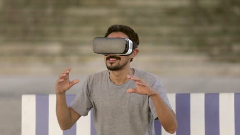 Happy-man-in-VR-headset-on-street
